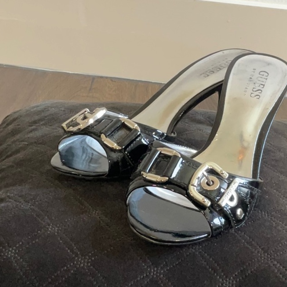 Beautiful patented black guess 2 inch heels size 5